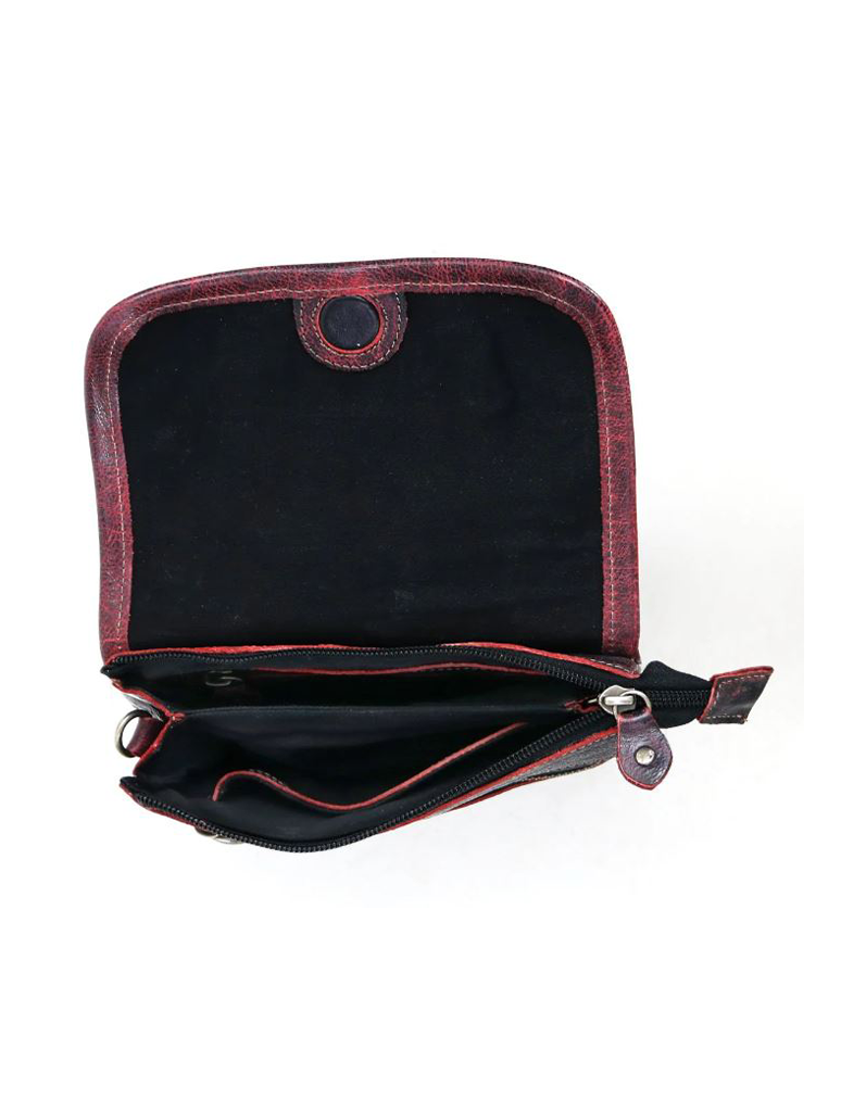 Open Ziggy crossbody bag displaying inner divider and pockets