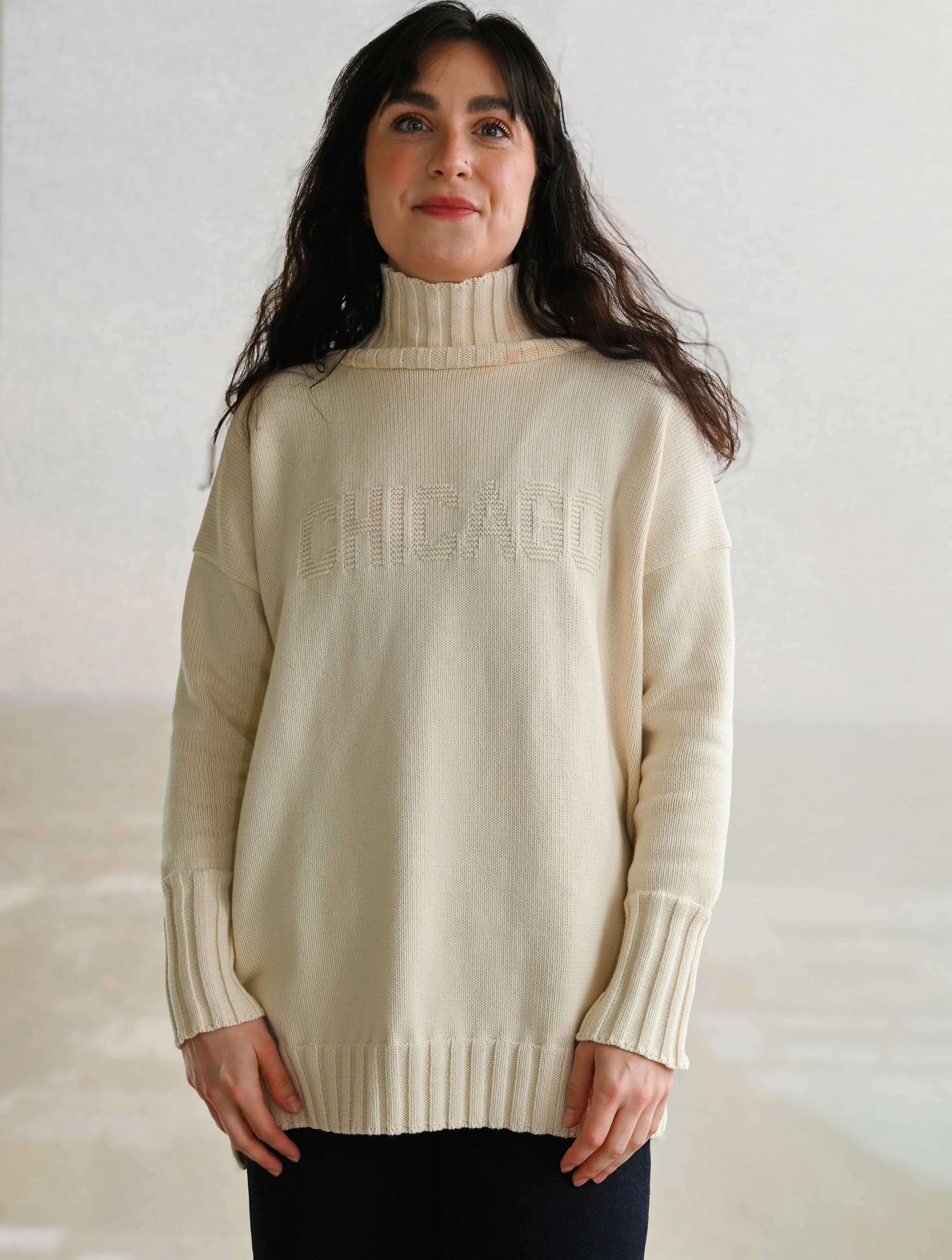 "Chicago" Embossed Funnel Neck Sweater